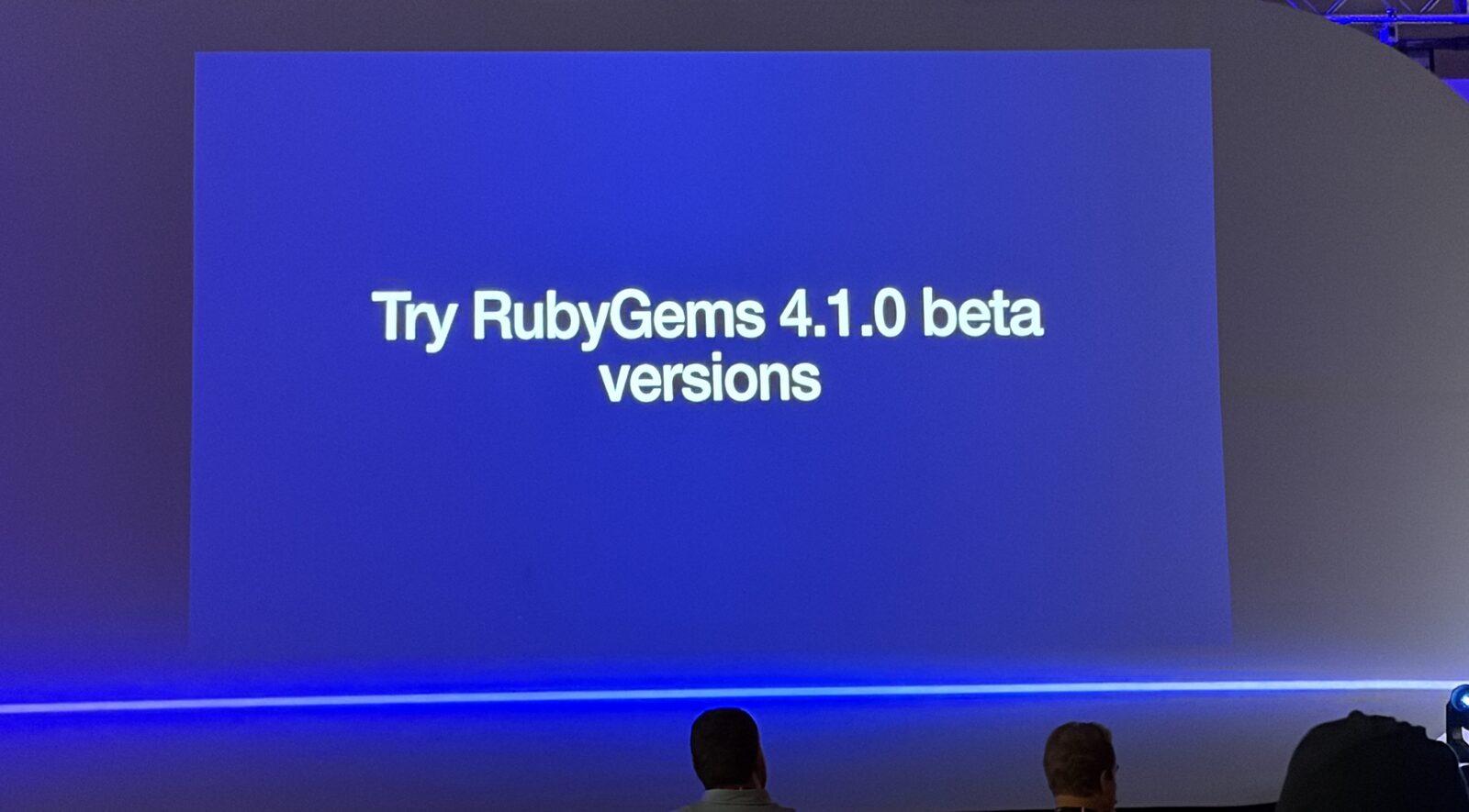 A slide reading 'Try RubyGems 4.1.0 beta versions' on a blue background
